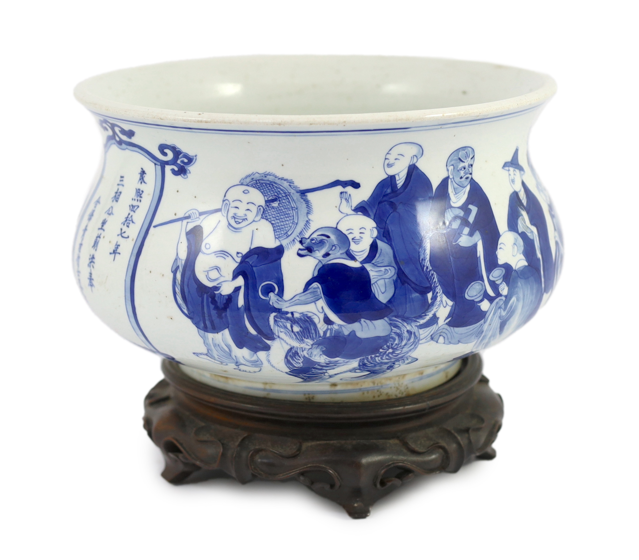 A rare Chinese blue and white ‘eighteen luohan’ censer, Kangxi period, inscribed dedication and cyclical date for 1709